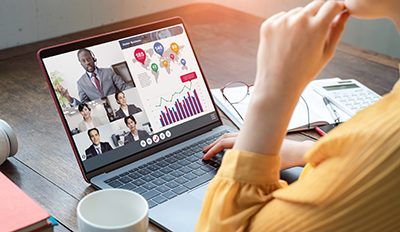 Person projecting growth through laptop